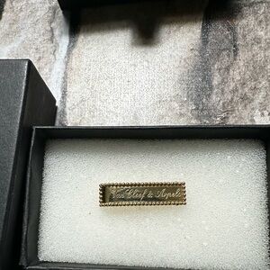 Van Cleef & Arpels Gold Rectangular Beaded Logo